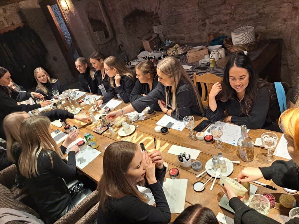 Tourist group in a home spa workshop in Tallinn Old Town